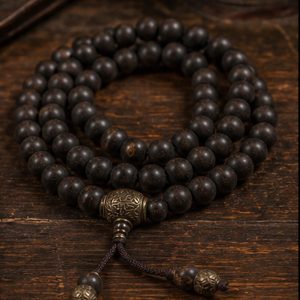 Black Bodhi 108 Mala with Counter Bead dark Tibetan-inspired product scene