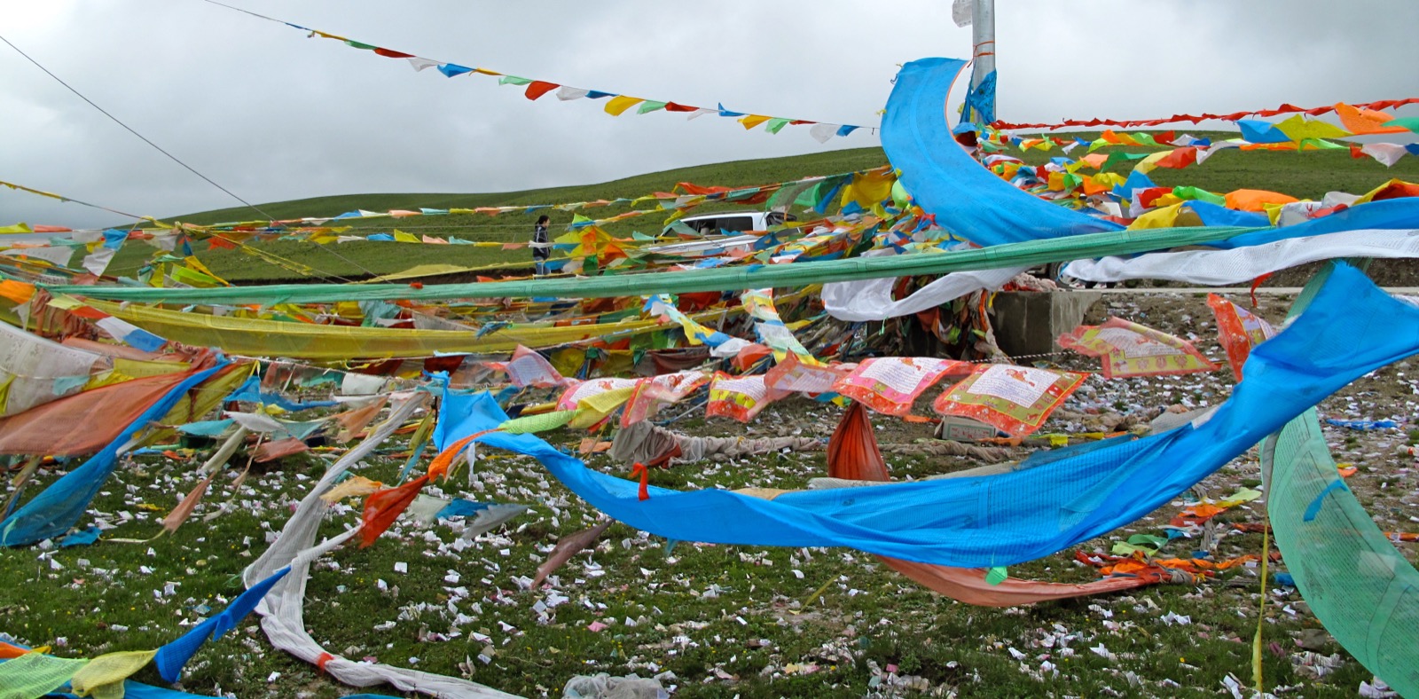 Highland prayer flags and mountain road for protection cord story