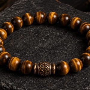Close detail of Tiger Eye Sun Path Bracelet golden bead bands