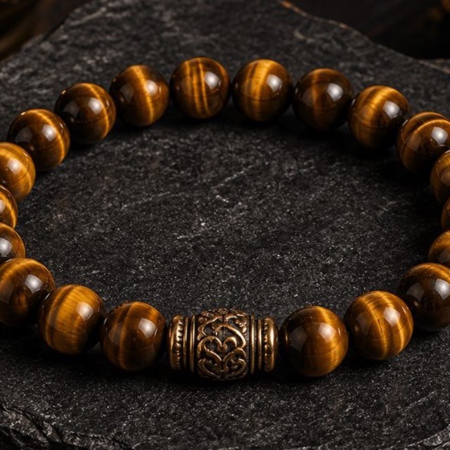 Close detail of Tiger Eye Sun Path Bracelet golden bead bands