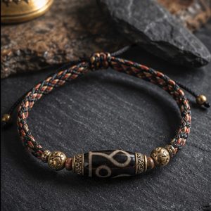 Wind Horse Dzi Braided Cord Bracelet dark Tibetan-inspired product scene